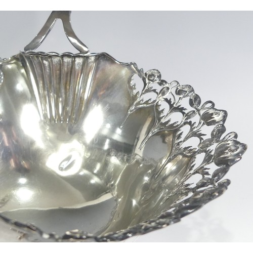 95 - A late 19thC Continental (800) silver swing handled Basket, of shaped oval form with fluted decorati... 