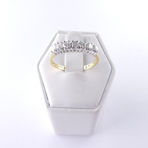 304 - An 18ct yellow gold seven stone diamond Ring, estimated total diamond weight 0.5ct, claw set in whit... 