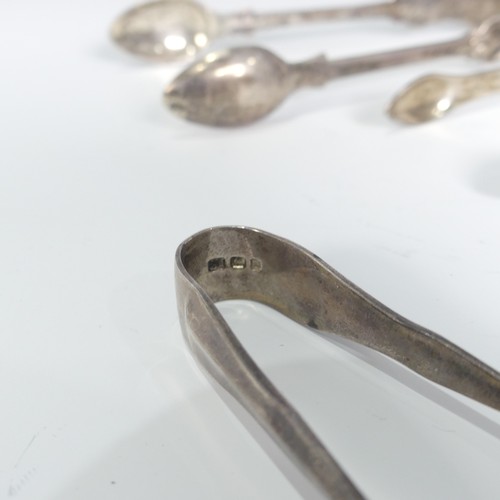 100 - A pair of George III silver Sugar Tongs, by Hester Bateman, c.1780, of typical form with bright cut ... 