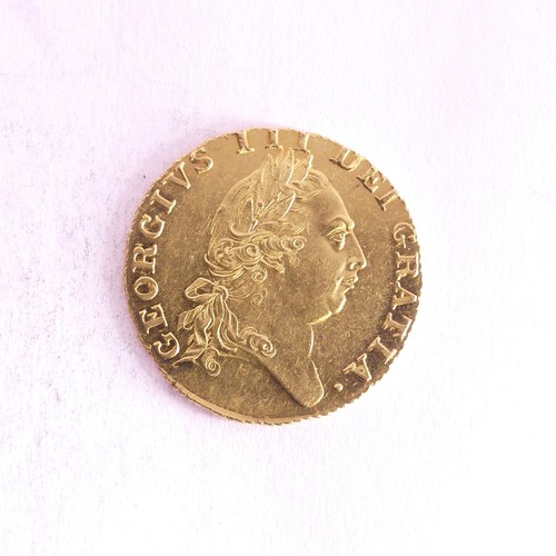 642 - A George III gold Guinea, dated 1787, with spade shaped shield reverse.Provenance; The Jeffery Willi... 