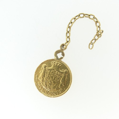 736 - A Danish 20 Kroner gold Coin, dated 1916, soldered to mount/chain, chain tests as 18ct, total weight... 