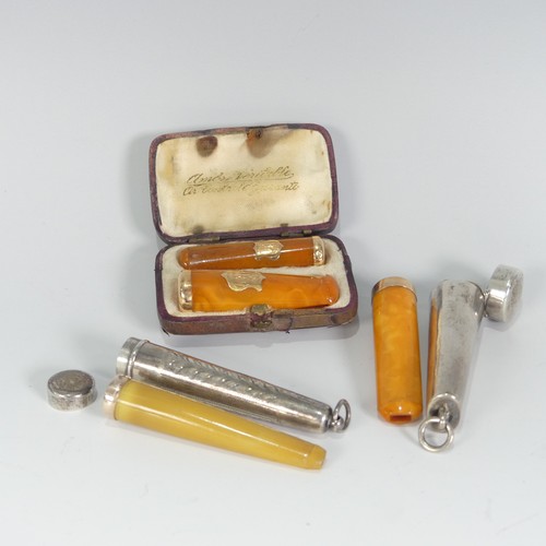 117 - A pair of early 20thC gold mounted amber Cheroot Holders, in fitted leather case, together with a la... 