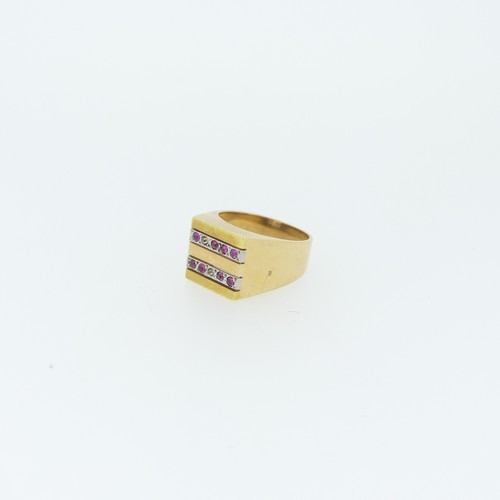 319 - An unmarked yellow gold Ring, the square front set two rows of pink stones, two missing, tests as 18... 