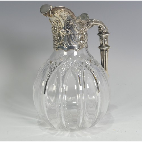 119 - A silver mounted cut glass Claret Jug, by John Grinsell & Sons, hallmarked Birmingham 1891, the ... 