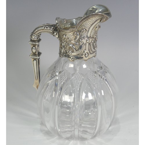 119 - A silver mounted cut glass Claret Jug, by John Grinsell & Sons, hallmarked Birmingham 1891, the ... 