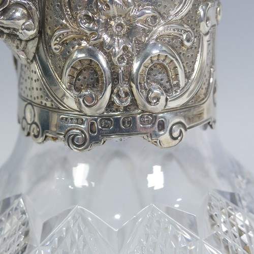 119 - A silver mounted cut glass Claret Jug, by John Grinsell & Sons, hallmarked Birmingham 1891, the ... 