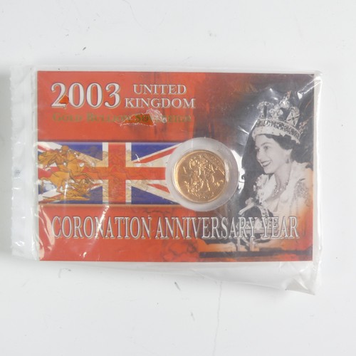 738 - An Elizabeth II 'Bullion' gold Sovereign, dated 2003, in carded blister pack.