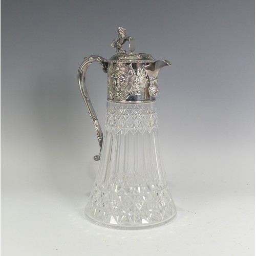 121 - A silver plate mounted cut glass Claret Jug, in the manner of Elkington & Co., the collar with f... 