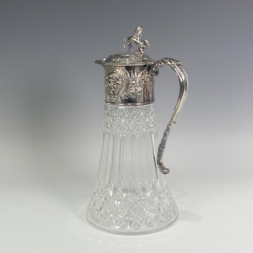 121 - A silver plate mounted cut glass Claret Jug, in the manner of Elkington & Co., the collar with f... 