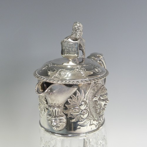 121 - A silver plate mounted cut glass Claret Jug, in the manner of Elkington & Co., the collar with f... 