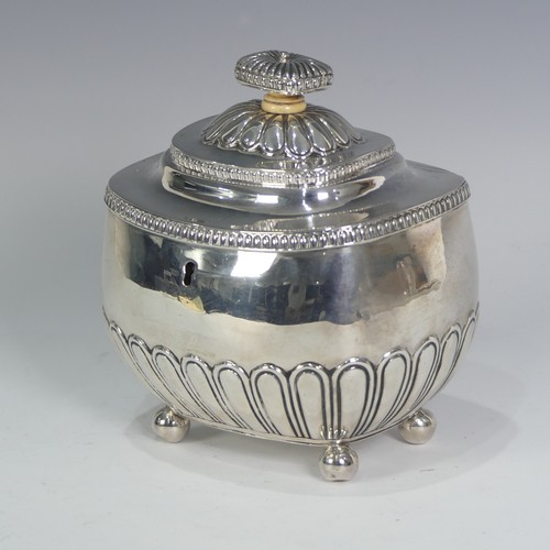 122 - A George III silver Tea Caddy, by William Bennett, hallmarked London, 1812, of rounded rectangular f... 