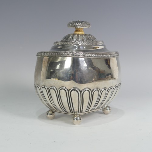 122 - A George III silver Tea Caddy, by William Bennett, hallmarked London, 1812, of rounded rectangular f... 