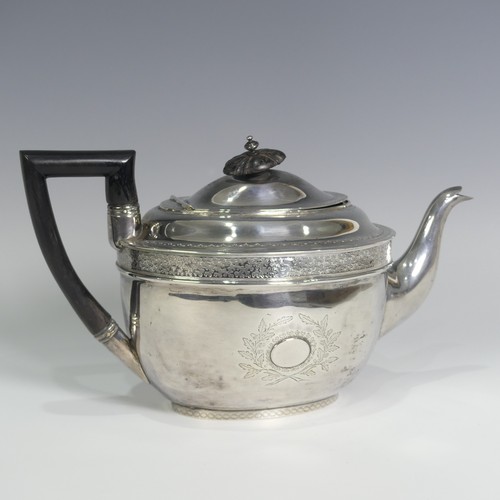 124 - A George III silver Teapot, hallmarked London, 1805, of oval form with bright cut decoration, wooden... 