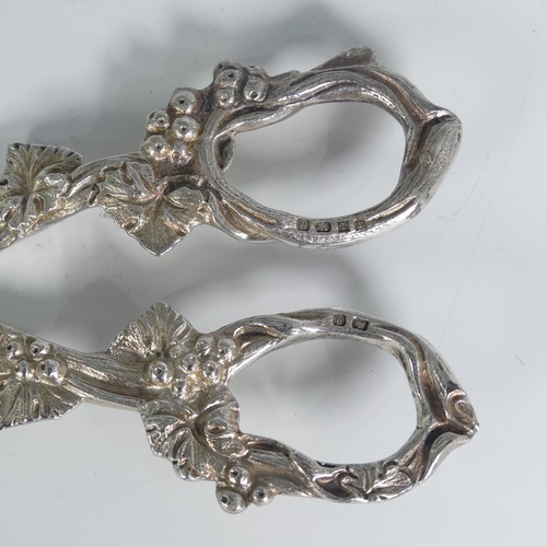 129 - A pair of Elizabeth II silver Grape Scissors, by Charles S Green & Co Ltd., hallmarked Birmingha... 