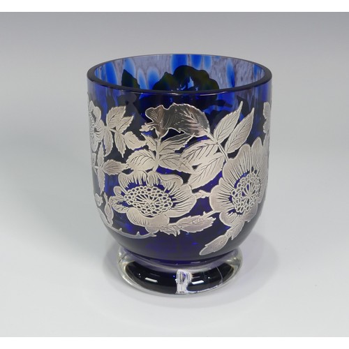 133 - A contemporary glass Vase, by Laugharne, of goblet form with circular foot, the mottled cobalt blue ... 