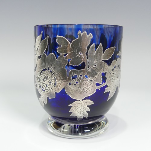 133 - A contemporary glass Vase, by Laugharne, of goblet form with circular foot, the mottled cobalt blue ... 