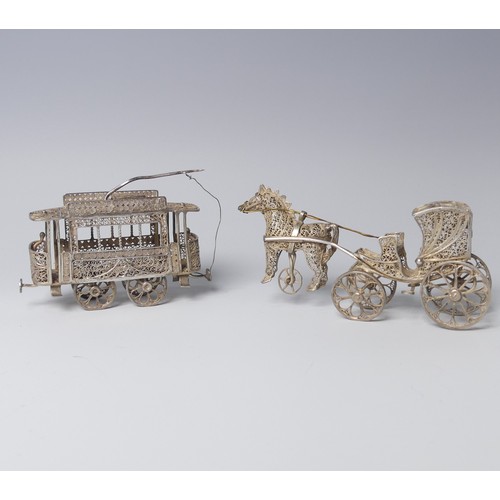 135 - An early 20th century silver filigree miniature model of a Tram, with four wheels and pantograph, 9c... 