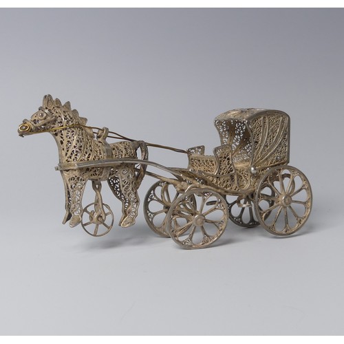 135 - An early 20th century silver filigree miniature model of a Tram, with four wheels and pantograph, 9c... 