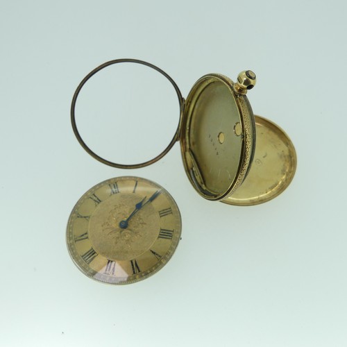 243 - An 18ct gold Fob Watch, the gilt dial with black Roman Numerals, foliate engraved case back, metal c... 