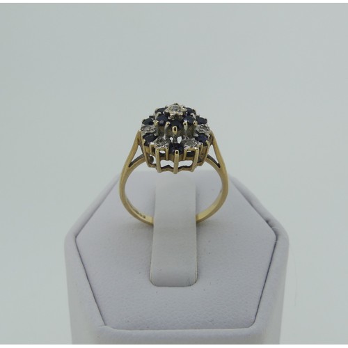 328 - A small graduated five stone diamond Ring, in boat shaped mount with scroll gallery, all in 9ct gold... 