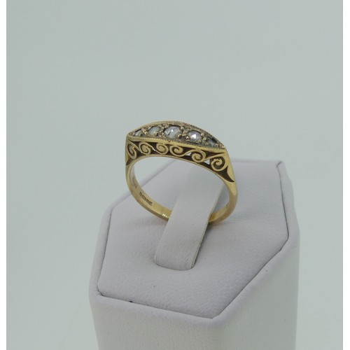 328 - A small graduated five stone diamond Ring, in boat shaped mount with scroll gallery, all in 9ct gold... 