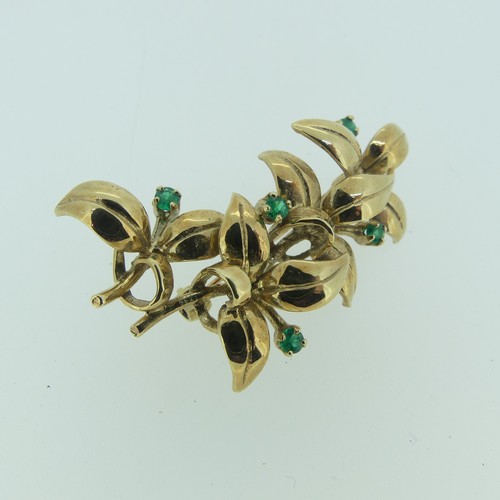 432 - A 9ct yellow gold foliate Brooch, set with five small circular emeralds, 4.5cm long, approx total we... 