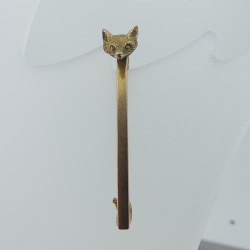 434 - A 9ct yellow gold Bow Brooch, 3.5cm long, together with a 9ct gold bar brooch with fox mask at one e... 