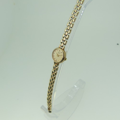 245 - A 9ct gold lady's Rotary Wristwatch, on 9ct gold bracelet strap, gross total weight 12.7g.... 