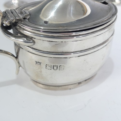 153 - An Edwardian silver Mustard Pot, by S W Smith & Co., hallmarked London, 1905, of oval form with ... 