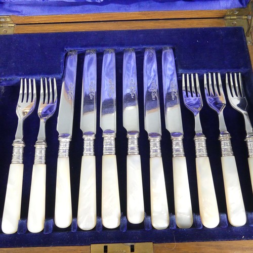 159 - A quantity of Silver Plate, including a pair of bottle coasters, toast racks, sauce boats, flatware ... 