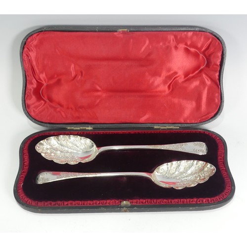 164 - A cased pair of Victorian silver Berry Spoons, by John Aldwinckle & James Slater, hallmarked Lon... 