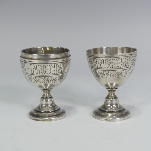 167 - A Russian silver Travelling Egg Cup, in the form of an egg that pulls apart with each half having a ... 