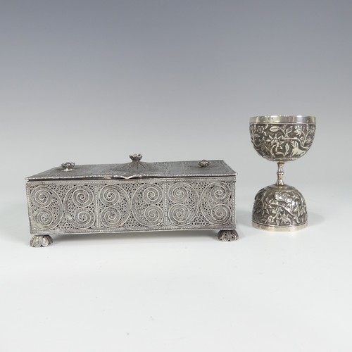 168 - An Indian silver double Spirit Measure, unmarked but tested, decorated with animals amongst foliage,... 