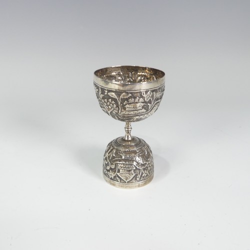 168 - An Indian silver double Spirit Measure, unmarked but tested, decorated with animals amongst foliage,... 