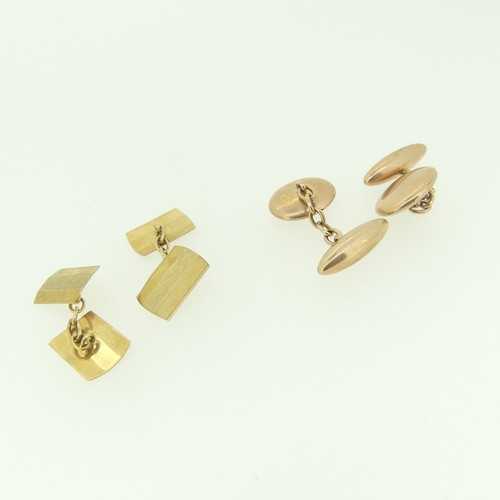 509 - A pair of 9ct rose gold Cufflinks, with plain oval fronts and bullet reverse, together with a pair o... 