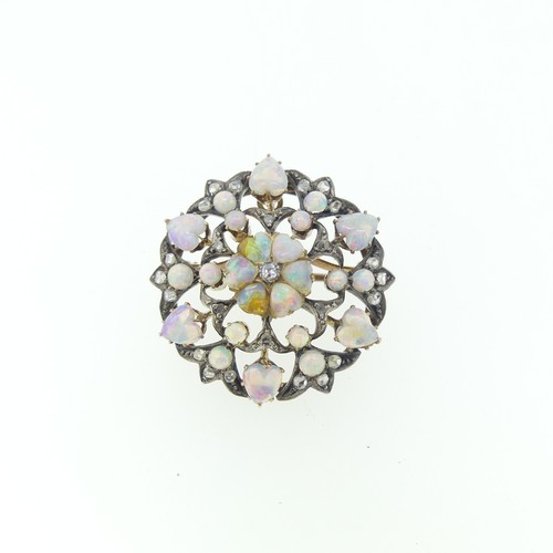 439 - A antique opal and diamond Pendant / Brooch, of open circular form, the centre with five heart shape... 