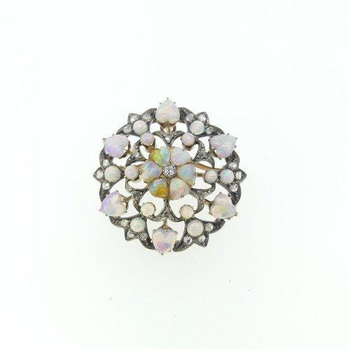 439 - A antique opal and diamond Pendant / Brooch, of open circular form, the centre with five heart shape... 