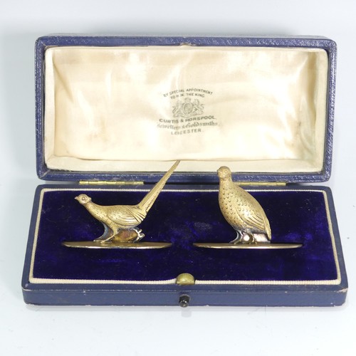 176 - A cased pair of George V silver gilt Menu Holders, by C & C Hodgetts, hallmarked Birmigham, 1913... 