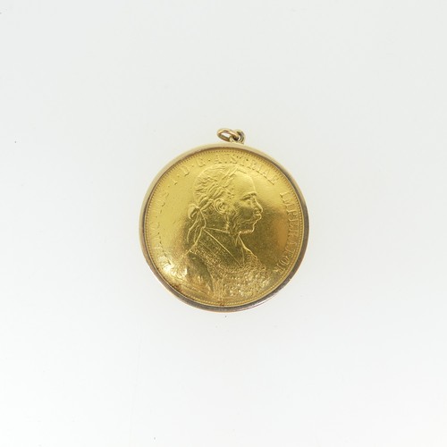 765 - An Austro-Hungarian 1915 restrike 4 Ducat gold Coin, in unmarked pendant mount, assessed as 9ct gold... 