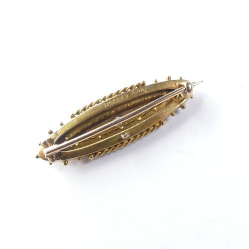 443 - A Victorian 15ct gold Brooch, the centre gypsy set with three diamonds, 4.3cm long, 4.7g.... 