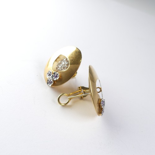 444 - A pair of 9ct yellow gold knot Earrings 2.3g, together with a pair of 18ct hollow oval earrings, set... 