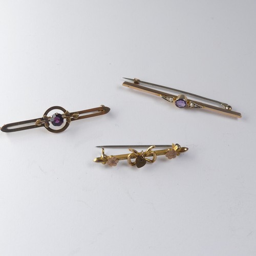 445 - A 9ct yellow gold Bar Brooch, the centre set amethyst and seed pearl, 6cm long, together with a 9ct ... 