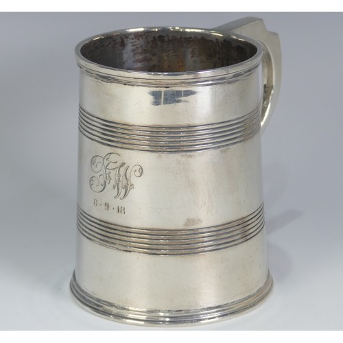 187 - A George V silver Mug, by Mappin & Webb Ltd., hallmarked Sheffield, 1917, tapering with bands of... 