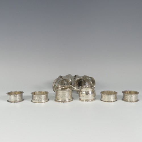 196 - An Edwardian silver Napkin Ring, hallmarked Birmingham, 1908, together with five other silver napkin... 