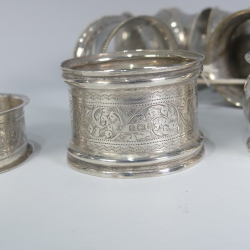 196 - An Edwardian silver Napkin Ring, hallmarked Birmingham, 1908, together with five other silver napkin... 