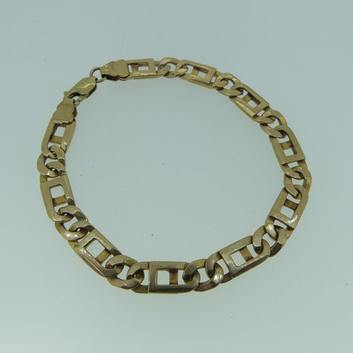 414 - A 9ct yellow gold flat link Bracelet, 21cm long, 19.6g.