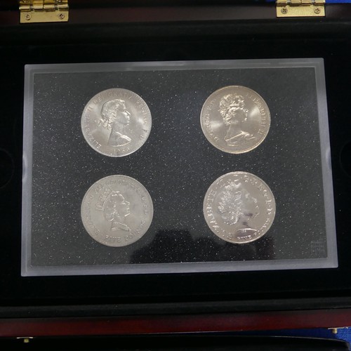 722 - A quantity of mainly Royal Commemorative Collectors Coins, including 'The Portraits of a Queen Four ... 