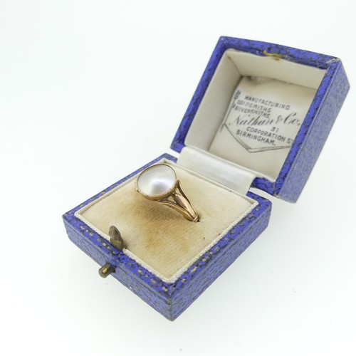 285 - An early 20thC mabe Pearl Ring, millegrain set in 9ct rose gold, Size P, approx total weight 2.6g.... 