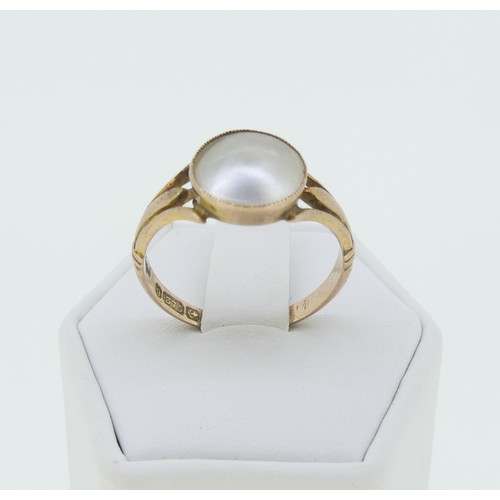 285 - An early 20thC mabe Pearl Ring, millegrain set in 9ct rose gold, Size P, approx total weight 2.6g.... 