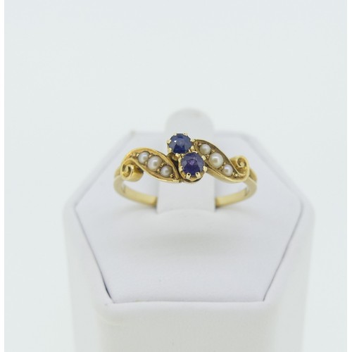 284 - A small early 20thC sapphire and seed pearl Ring, all mounted in 18ct yellow gold, Size P, approx. t... 